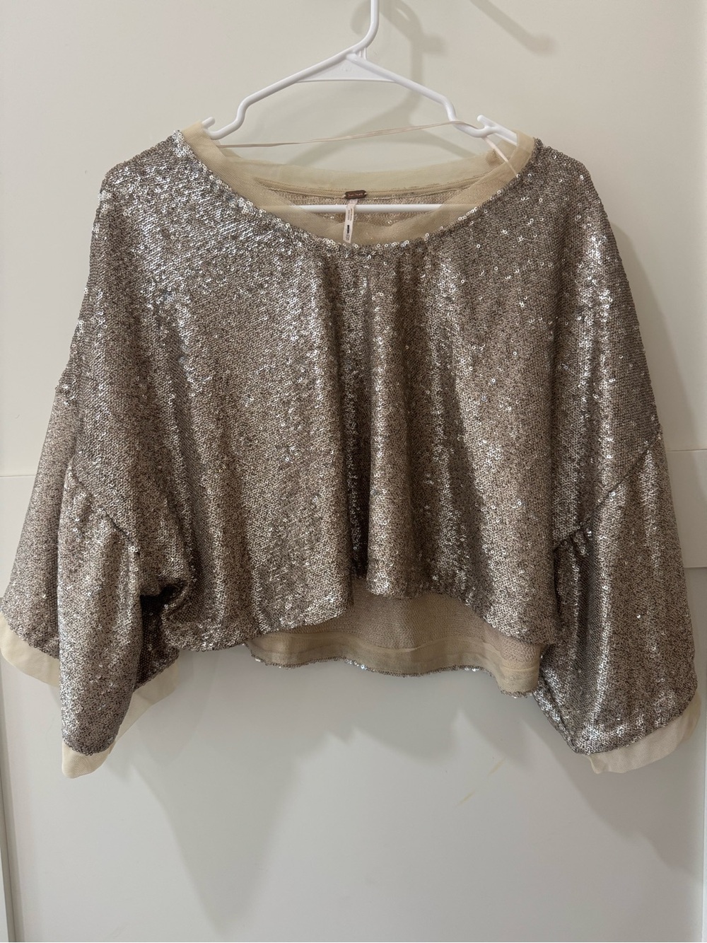 Free People Champagne Dreams Sequin Crop Pullover Top in gold. Size small